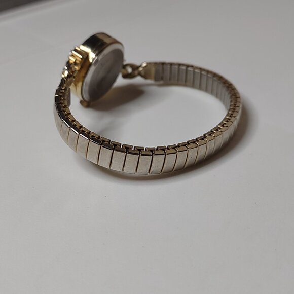 Pretty 6 Inch Gold Tone Stretch Watch With Clear Stones - Picture 10 of 13